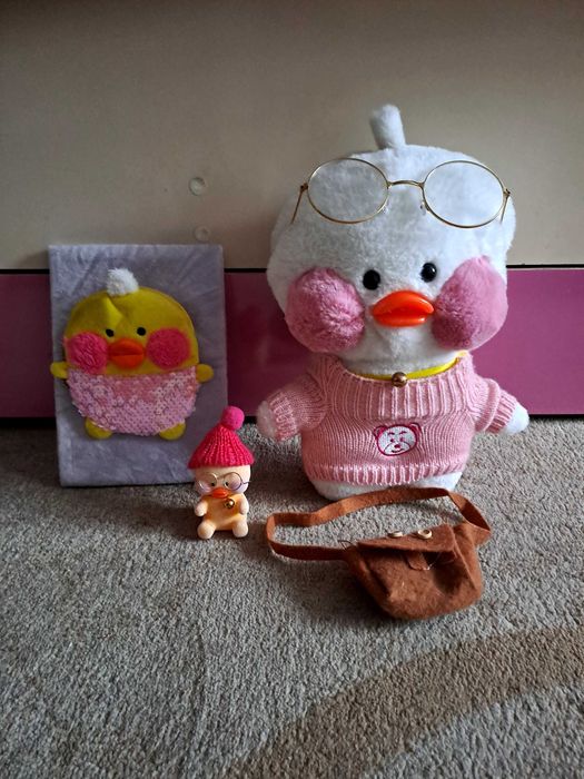 Мягкая игрушка и блокнот