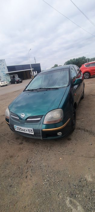 Ниссан алмера тино
