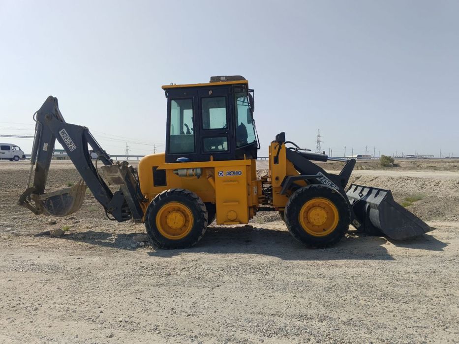 Экскаватор-погрузчик сотилади.