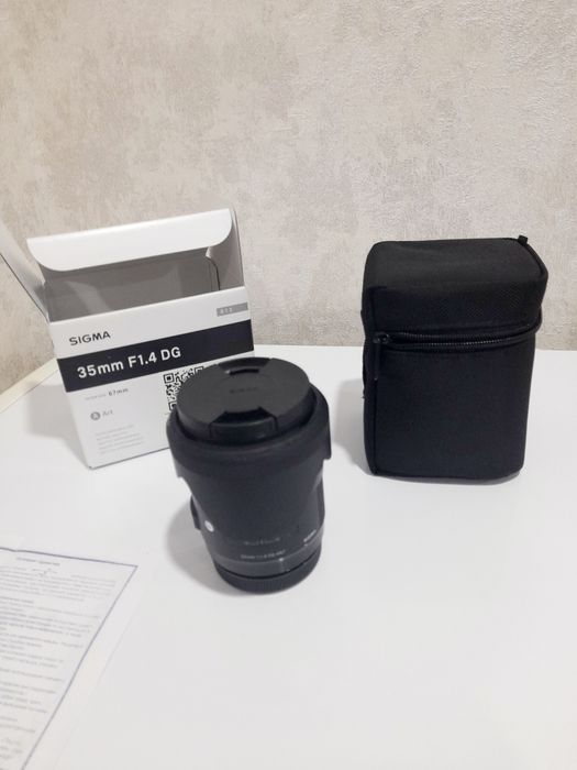 Продам объектив SIGMA 35мм F1.4DG