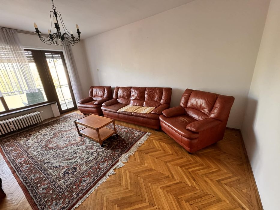 Set canapea si fotoliu din piele rosie uzata