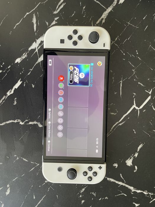 Nintendo Switch Oled cu accesorii (scrie in descriere) și Fc24 cadou