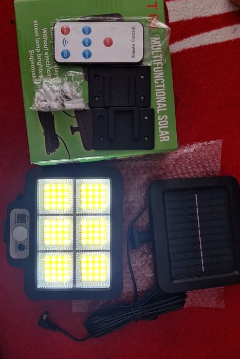 Set 2 bucăți lămpi solare cu fir si senzor de mișcare,  firul are o lungime de aproximativ 5 metri.
