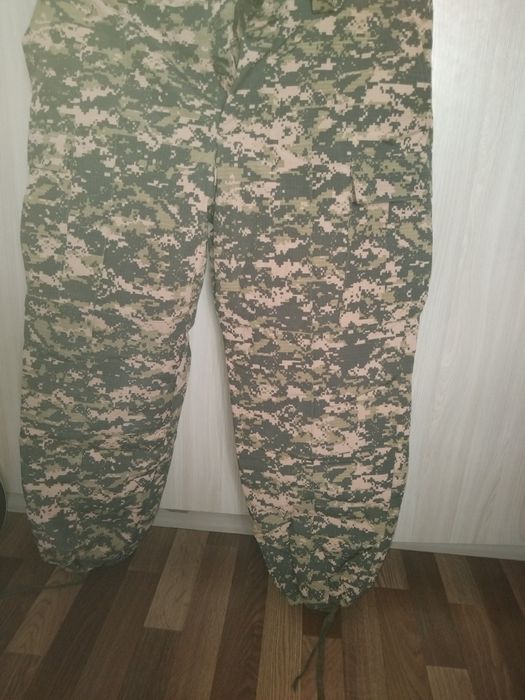 Камуфляж,  новый, брюки.