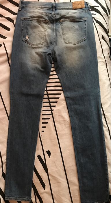 Сини скъсани дънки