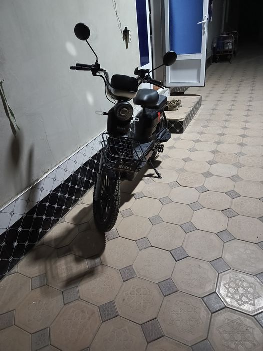 Скутер идеал холатта