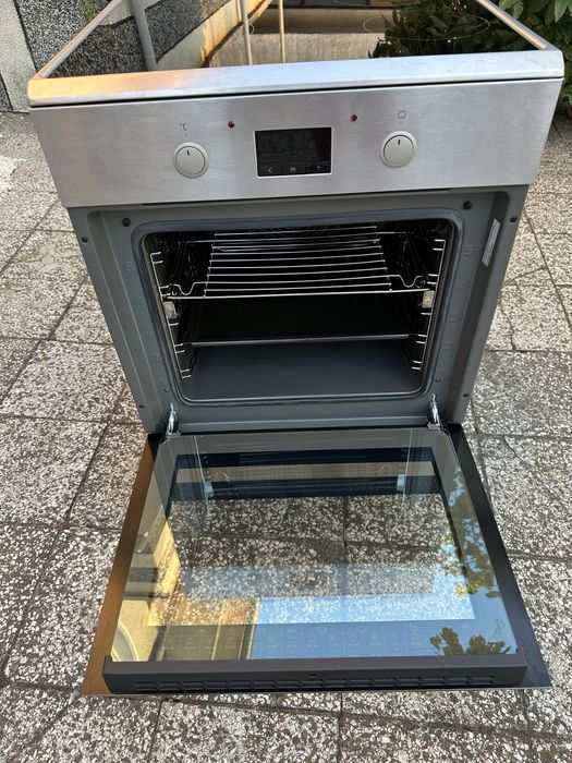 Свободностояща електрическа печка с индукционен плот KOENIC KFC 2311 A