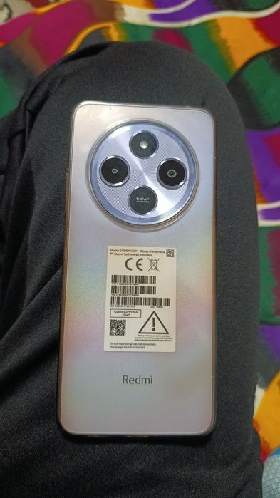 Redmi 14 C xaman joyi radnoy ayol kishi ishlatgan