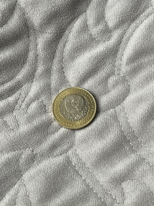 продам монету 100 тг 30 лет