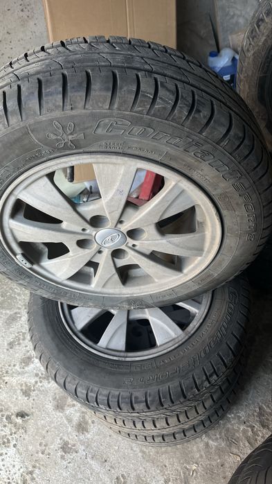 Продам летние шины с дисками р14