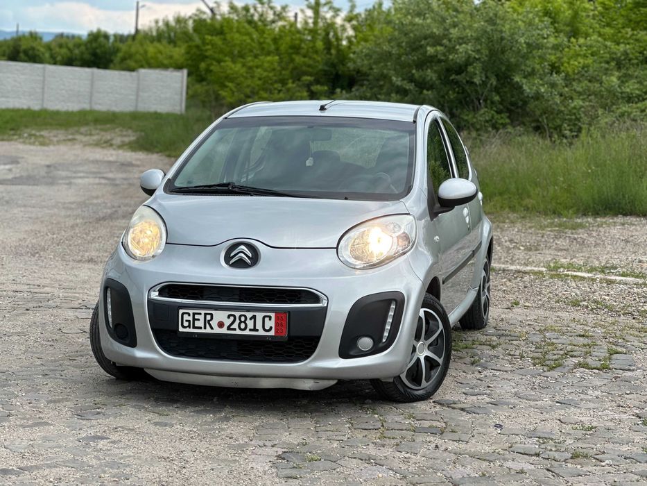 Citroen C1*lumini de zi~led*benzina*4 usi*clima*euro 5*af.2013 luna 03