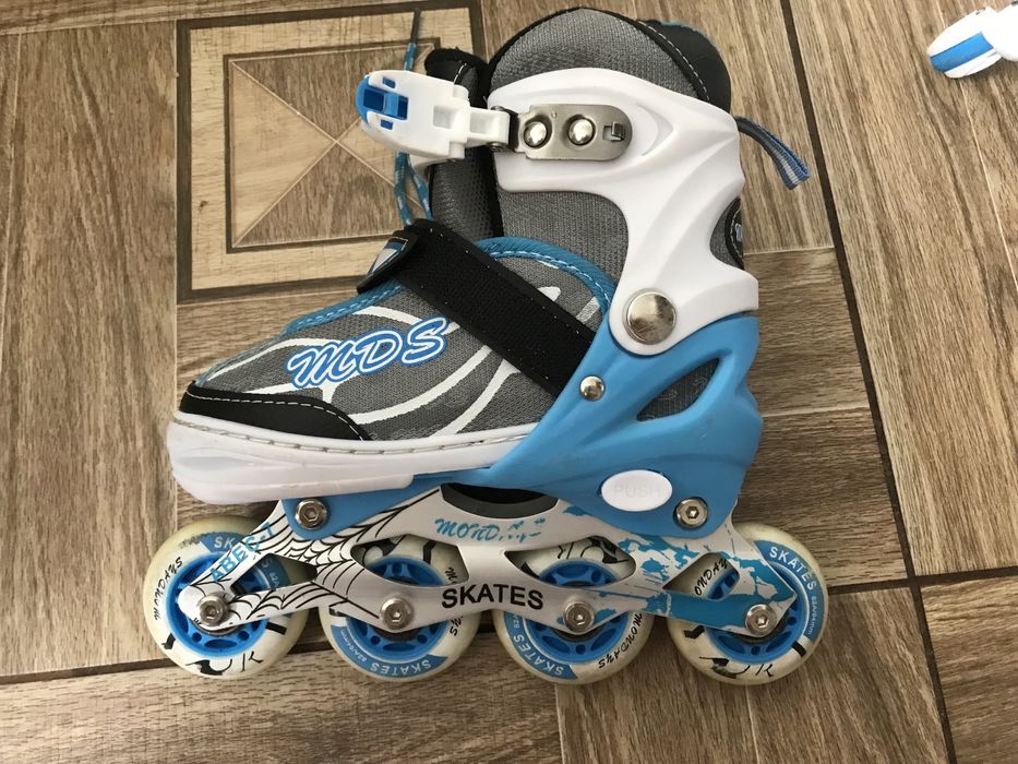 Роликовые коньки