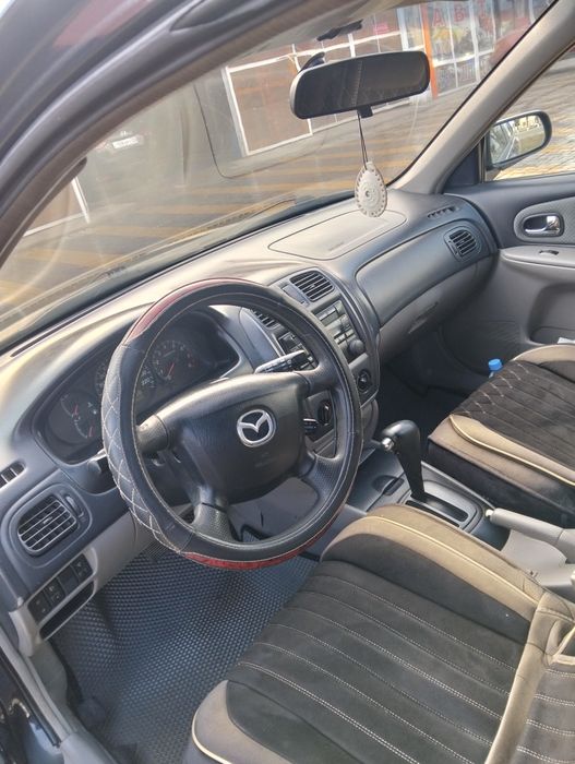 Мазда 323 находу