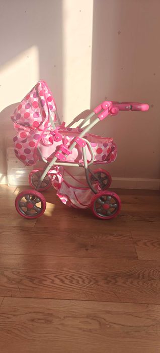 Игрушечная детская коляска