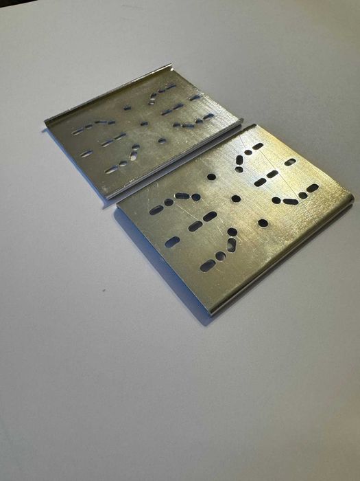 Фиксирующая пластина для монтажной шины