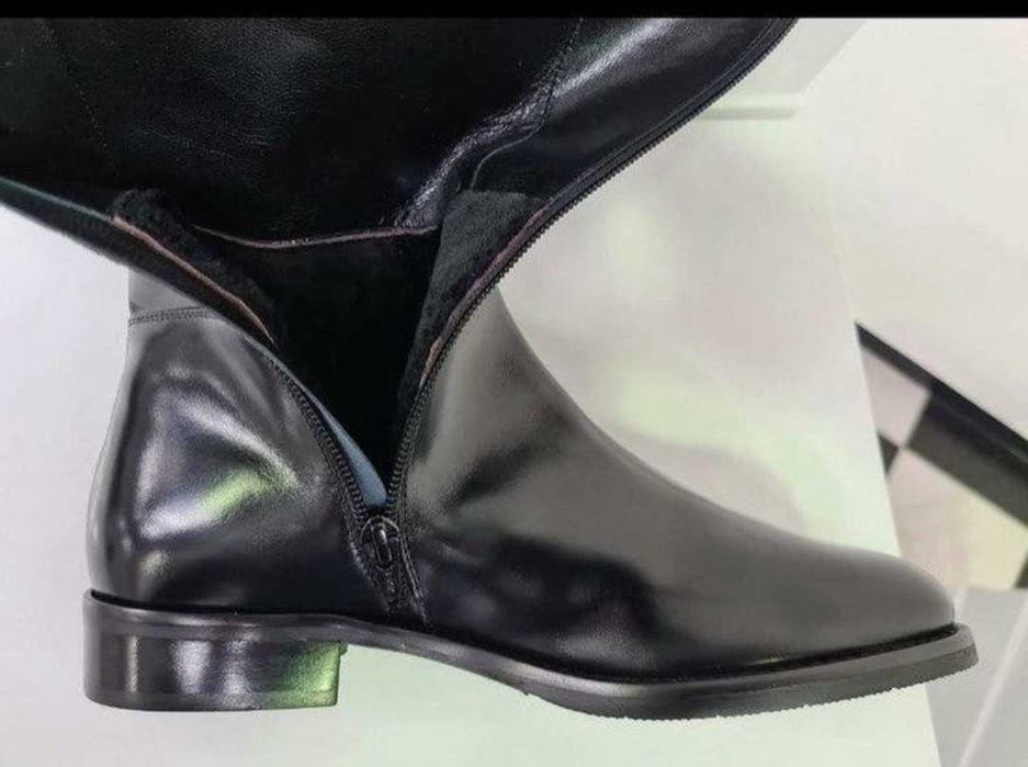 Продам кожаные сапоги