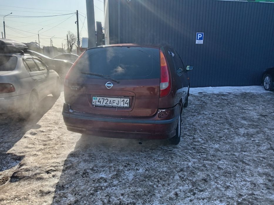 Ниссан алмера тино