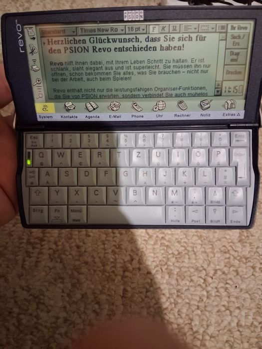 revolution computer calculator-"Psion" anului 99,functional ,colectie