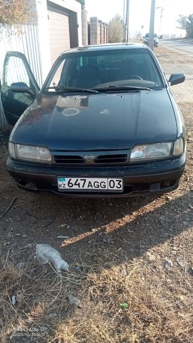 Ниссан примера 1992.