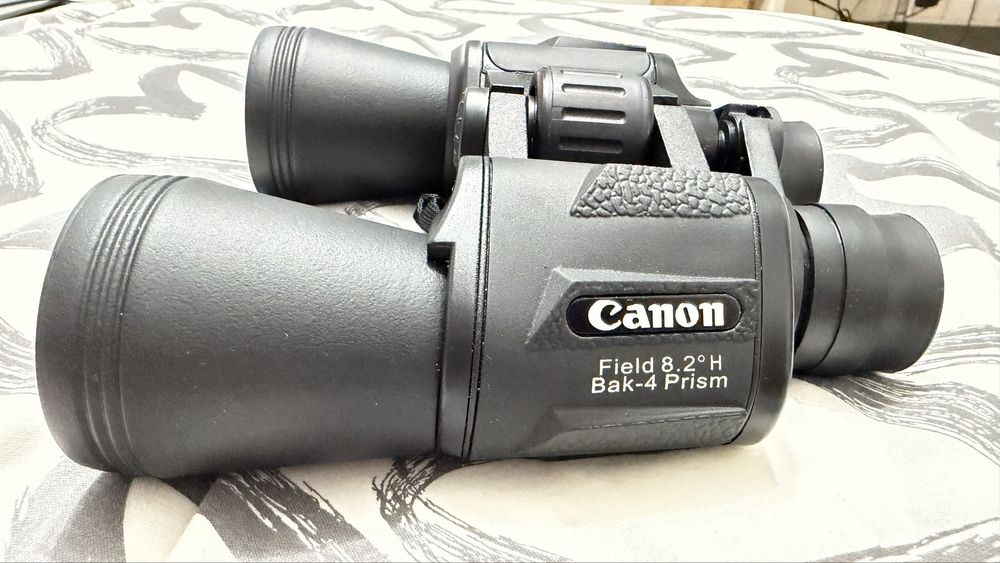 Binoclu Canon pt drumetii / vânătoare