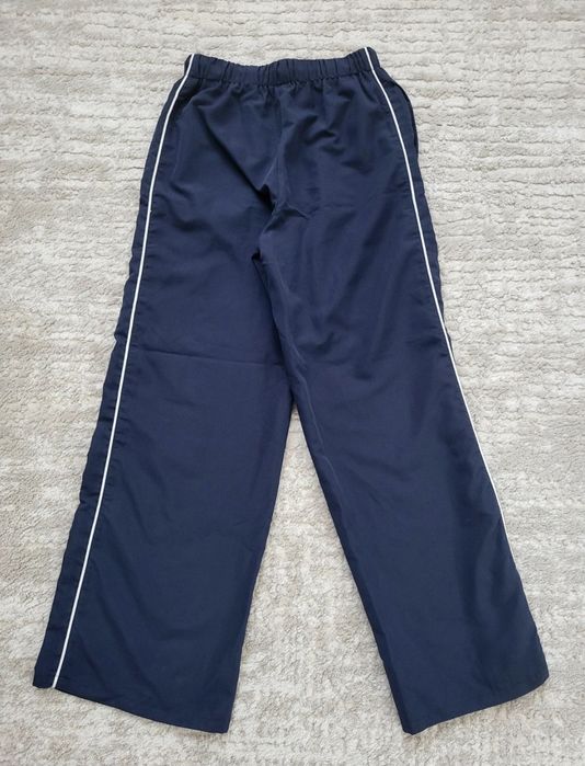 Pantaloni bleumarin cu dungi laterale
