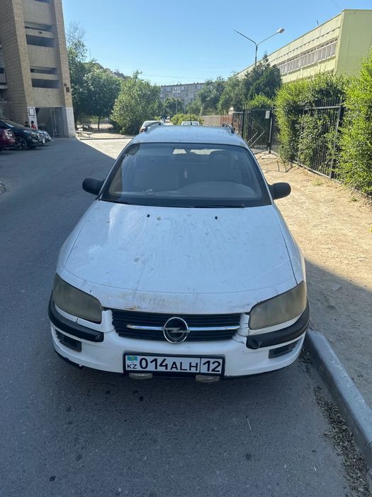 Опел омега универсал