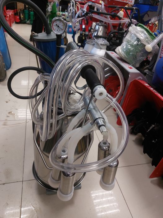 Доильный аппарат. Дойка.