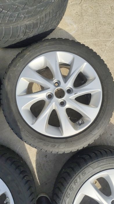 Jante aluminiu 4 X100 pe 15. Cu anvelope M+S . 185/55R15.