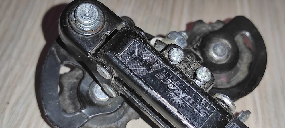 schimbator pt. pinioane bicicleta SUNRACE M2T pt. 6-7 pinioane patina mica pret 40 ron ( lipsa un surub pt. reglaj ( unde intra
