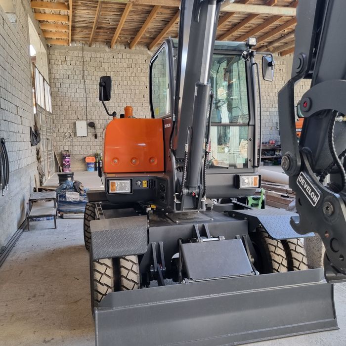 Экскаватор Develon DX60W eco 2025