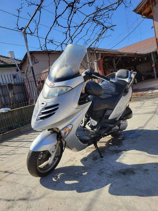 Vand sau schimb scuter kymco grand dink 250 cm