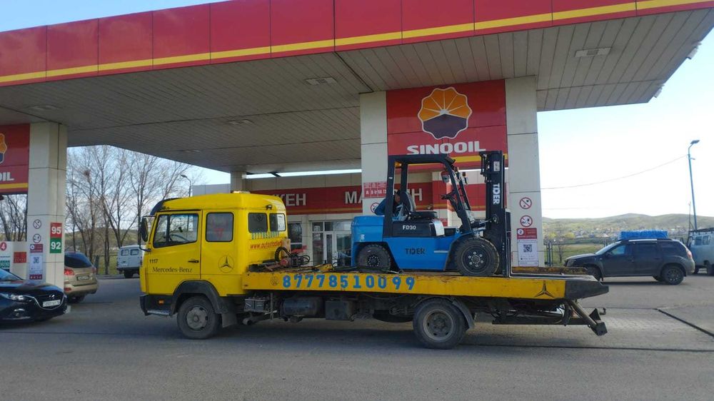 уборка снега экскаватор-погрузчик