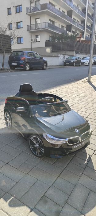 Mașinuta electrica BMW SERIA 6 GT cu telecomanda cu un singur motor