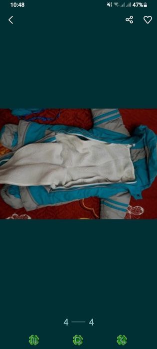 Продам зимний комбинезон трансформер