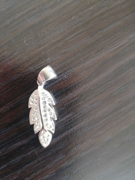 Сребърен комплект обеци и висулка.