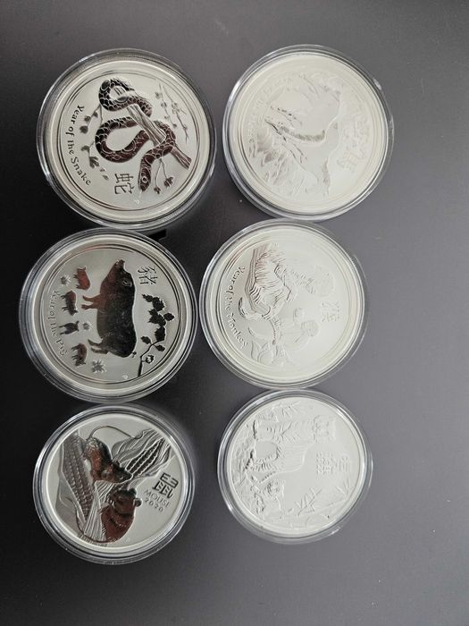 1 унция сребърни монети- Лунари от различни години 1 oz и 1/2 oz