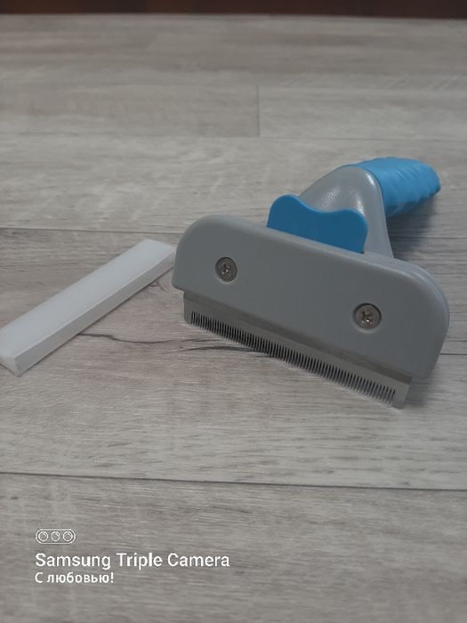 Щётка для вычесывания животных