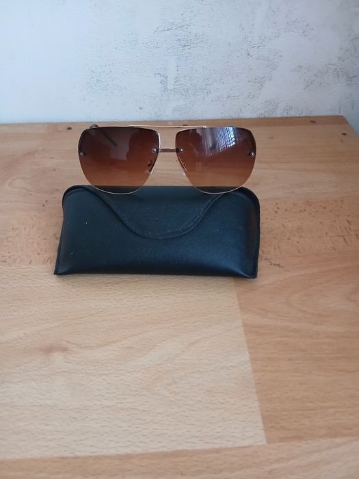 Два чифта очила с калъфи