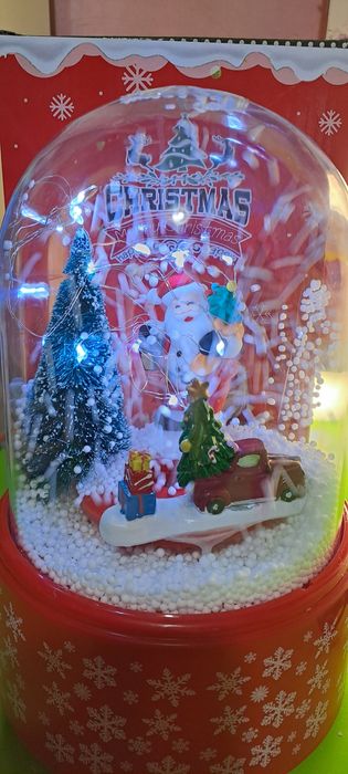 Янги йил учун сувенир музыкальный свети ёнади кор парчалари учади