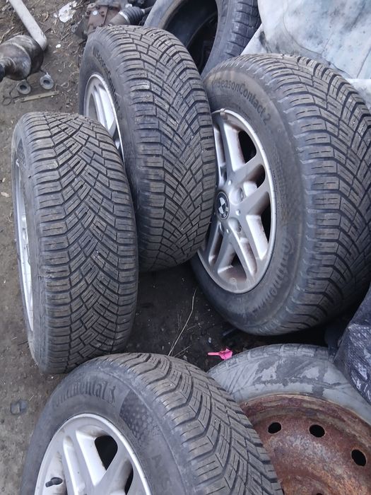 Jante cu anvelope mixte  195/65/15 bmw e46  dot 2024