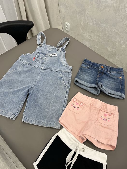 Продам 2 пакета одежды и сапоги