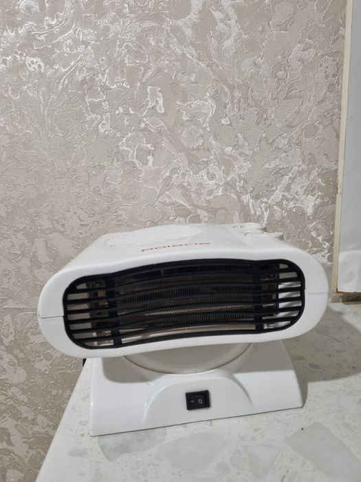 Вешалки и обогреватель