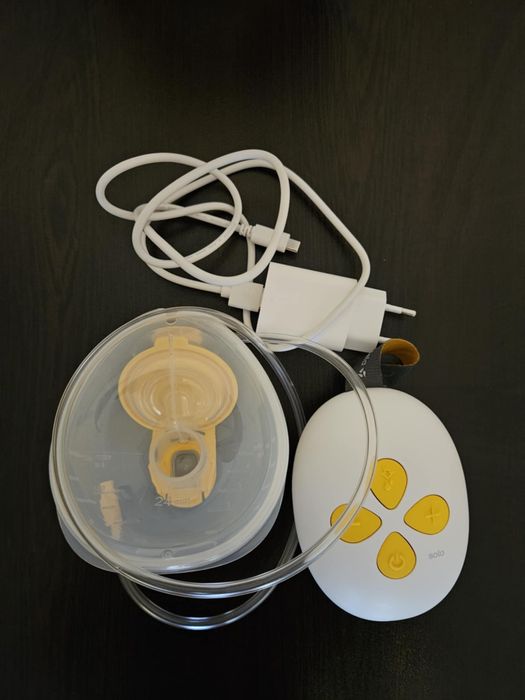 Помпа за кърма - Medela Solo (hands-free) + подаръци