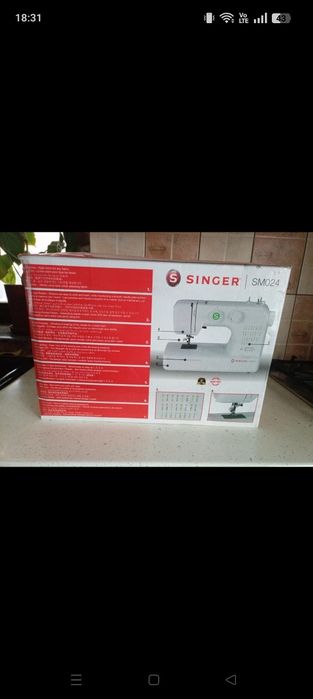 Mașina de cusut Singer