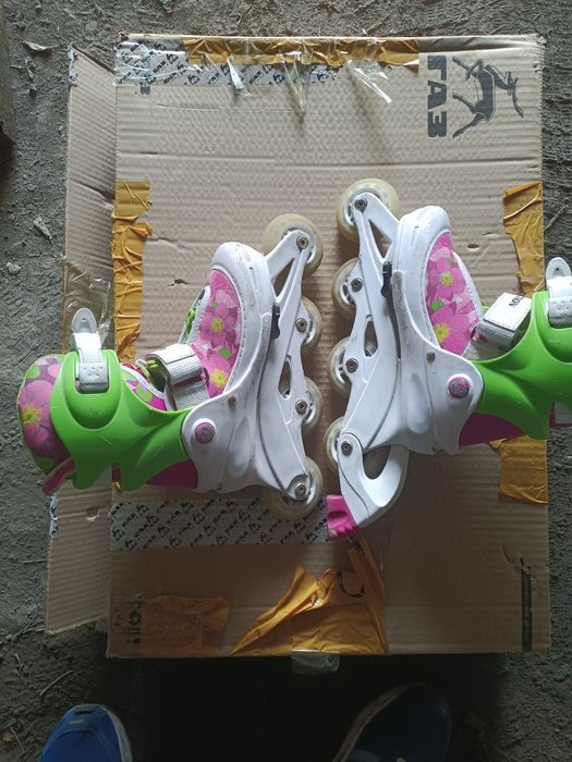 Роликовые коньки