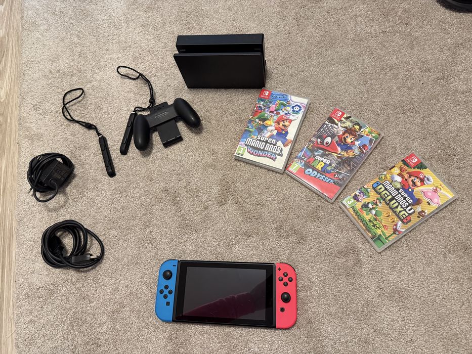 Vand nintendo switch aproape nou + 3 jocuri Mario