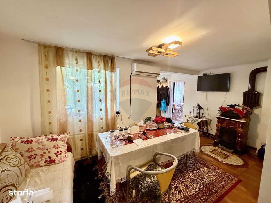 Casă cu teren si demisol In Tifesti