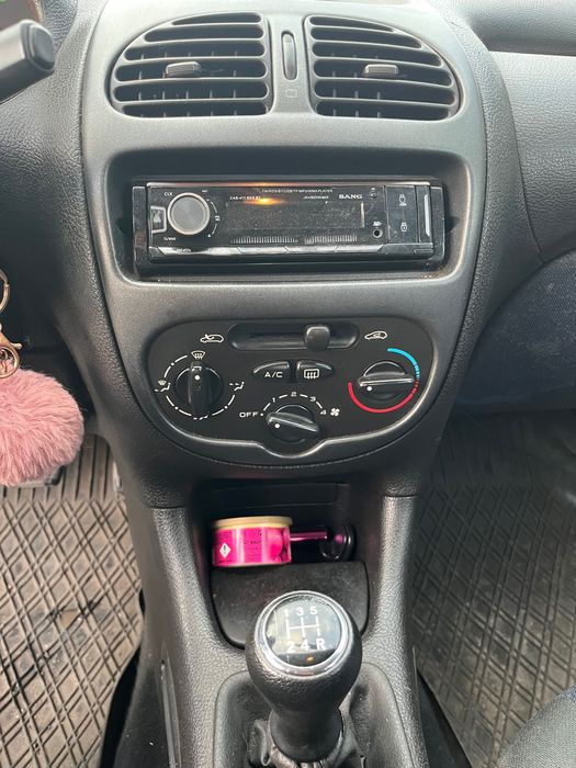 Peugeot  206 1.4 75 коня