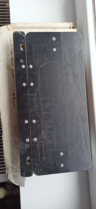 Suport de număr pliabil