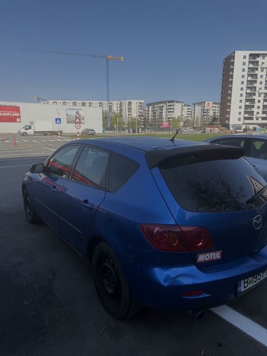 Mazda 3 an 2004 benzina